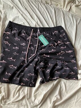 NIB yufawow 7" swim trunks sharks new in package opened but never used.